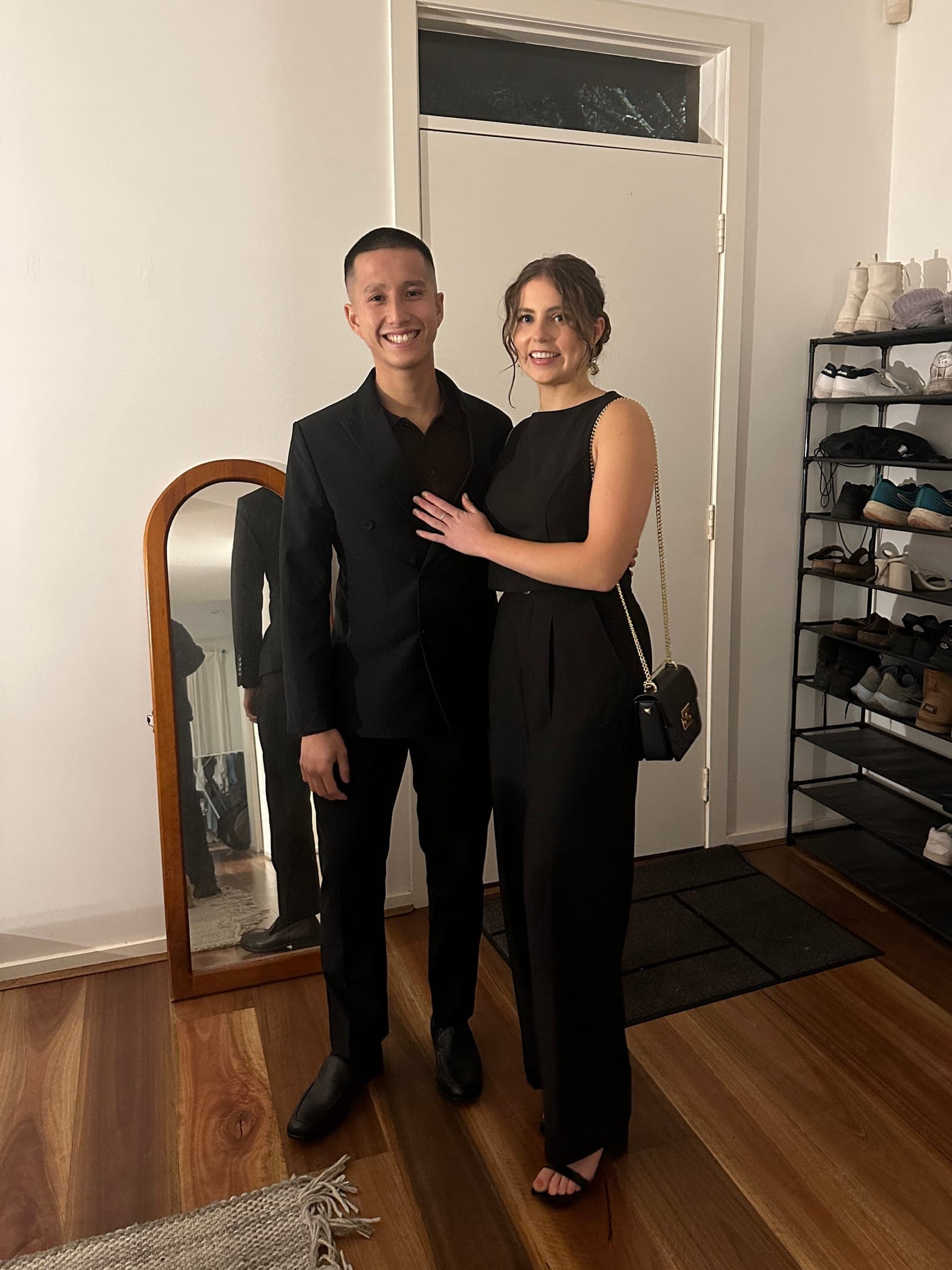 Claire and Martin dressed up together at home in Melbourne